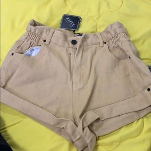 Khaki colored Denim shorts